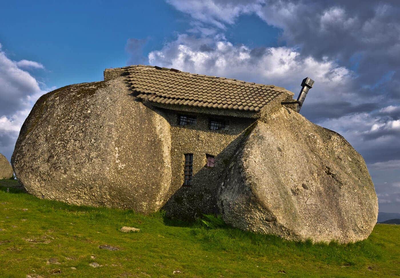 Casa Do Penedo: A Quirky Stone House Built From Giant Boulders In Portugal