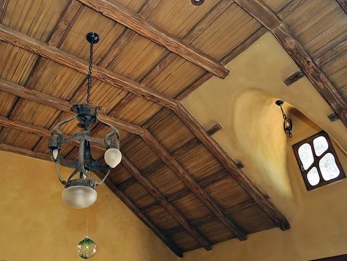An arched ceiling in the master bedroom